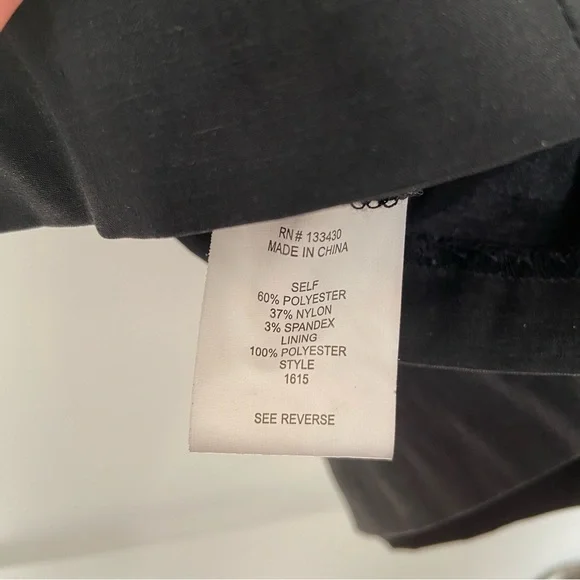 Black Mini Dress with Ruffled Shoulder - Picture 5 of 6